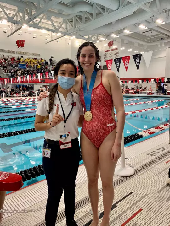 Estafania Zavala, DAT, Wisconsin sports medicine athletic trainer with swimmer Paige McKenna