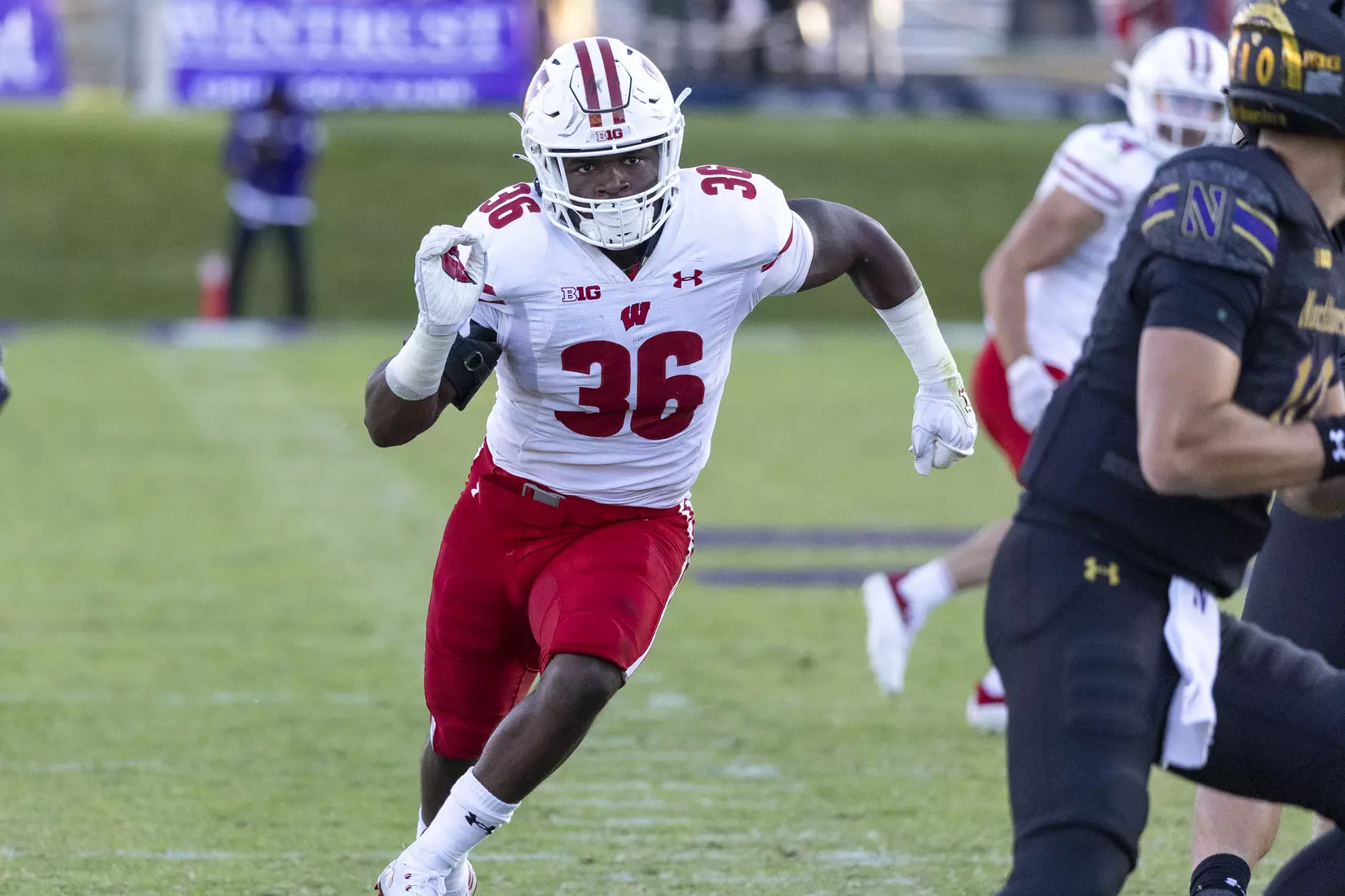 Wisconsin Badgers inside linebacker Jake Chaney (36) chases down the quarterback during an NCAA Big Ten Conference college football game against the Northwestern Wildcats on Saturday, Oct. 8, 2022, in Evanston, Ill. The Badgers defeated the Wildcats, 42-7.