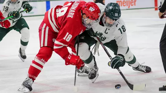 Owen Lindmark takes a faceoff at Michigan State