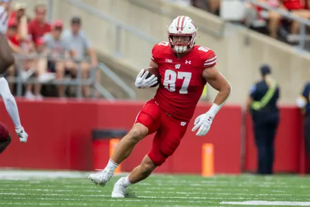 Wisconsin Badgers tight end Hayden Rucci (87) carries the ball during an NCAA college football game against the New Mexico State Aggies, Saturday, Sept. 17, 2022, in Madison, Wis. The Badgers won 66-7. (Photo by David Stluka/Wisconsin Athletic Communications)