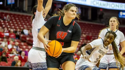 Tessa Towers holding the basketball