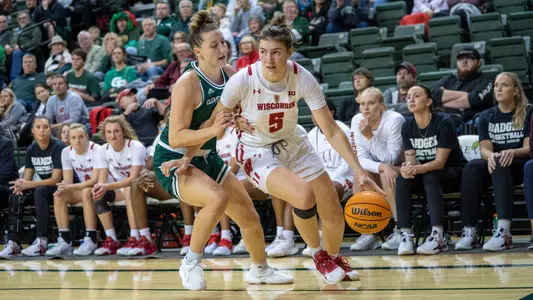 Julie Pospisilova driving towards the baseline