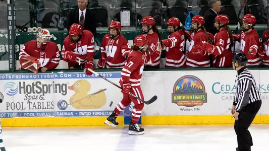 Britta Curl celebrates a goal in the Badgers' 13-1 win at Bemidji State on Friday, Dec. 2