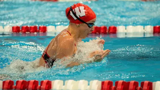 Katie McClintock competes in the breaststroke