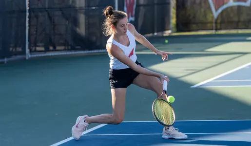 Ava Markham returns the ball during a match