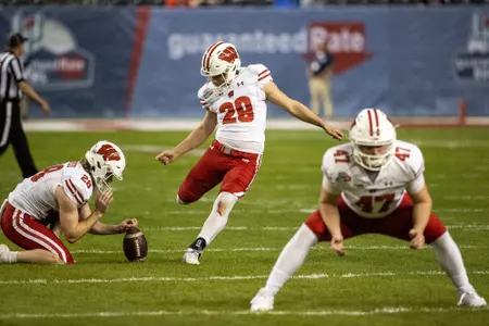 Wisconsin football kicker Nate Van Zelst warms up at Guaranteed Rate Bowl on Tuesday, Dec. 27, 2022