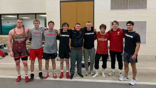 Wisconsin wrestlers at the 2022 Jim Koch Open hosted by UW-Parkside - (L-R) - Jonah Schmidtke, Gavin Model, Graham Calhoun, Jack Severin, team manager Bryce Trost, Cody Goebel, Aidan Medora, Cale Anderson and Kevin Meicher