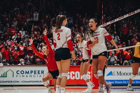 Sydney Hilley and Danielle Hart celebrating on the court for Wisconsin Volleyball 2021