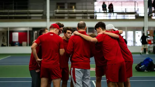 Wisconsin men's tennis team huddles before match vs. Drake