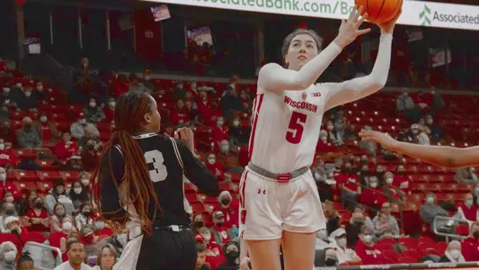 Julie Pospisilova drives to the basket