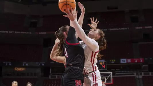 Brooke Schramek shoots over a Nebraska defender.