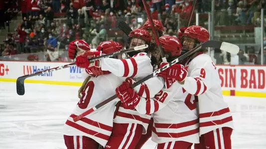 Badgers celebrate a goal against Bemidji State