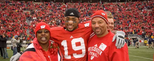 Paul Hubbard football with parents