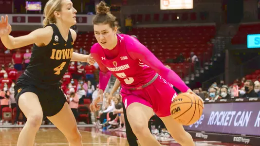 Julie Pospisilova drives around an Iowa defender.