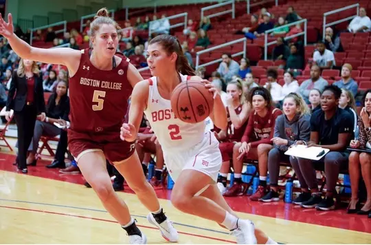 Katie Nelson drives around a BC defender