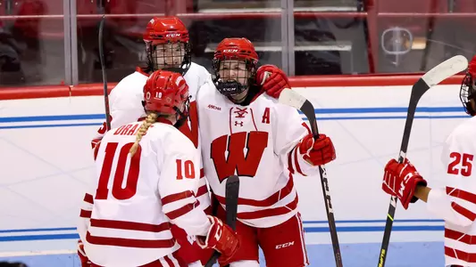 Badgers celebrate a goal from Daryl Watts in the NCAA Tournament