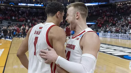 Brad Davison and Johnny Davis embrace - 2022 NCAA Tournament - First round vs. Colgate - Fiserv Forum - Milwaukee