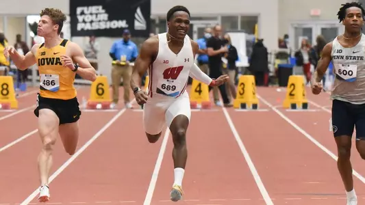 Lawrence Johnson crosses the finish line in the 60 meters.