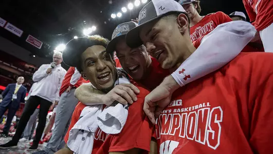 Johnny, Brad and Chucky celebrate after winning the Big Ten title