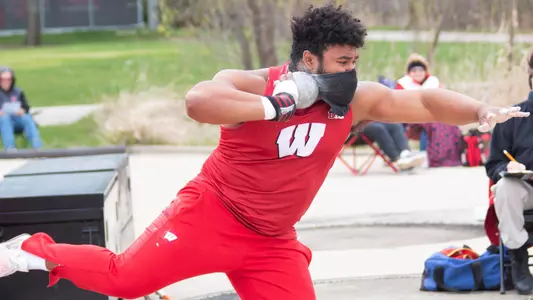 Andrew Stone throws the shot pur