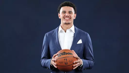 Johnny Davis poses during an NBA Draft photoshoot