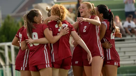 The women's soccer team celebrating after Adee Boer's goal