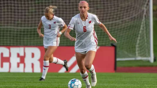Maddie Ishaug dribbling downfield