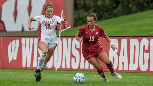 Aryssa Mahrt dribbling against a NIU defender