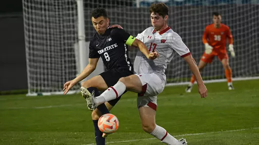 Ryan Keefe battles a Penn State player