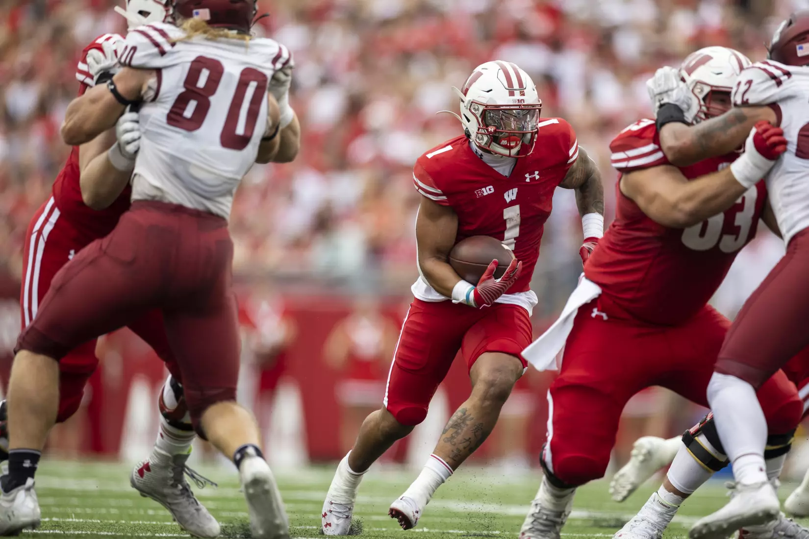 Chez Mellusi carries the ball in the Wisconsin Badgers game against the New Mexico State Aggies, Saturday, Sept. 17, 2022 in Madison, Wis.