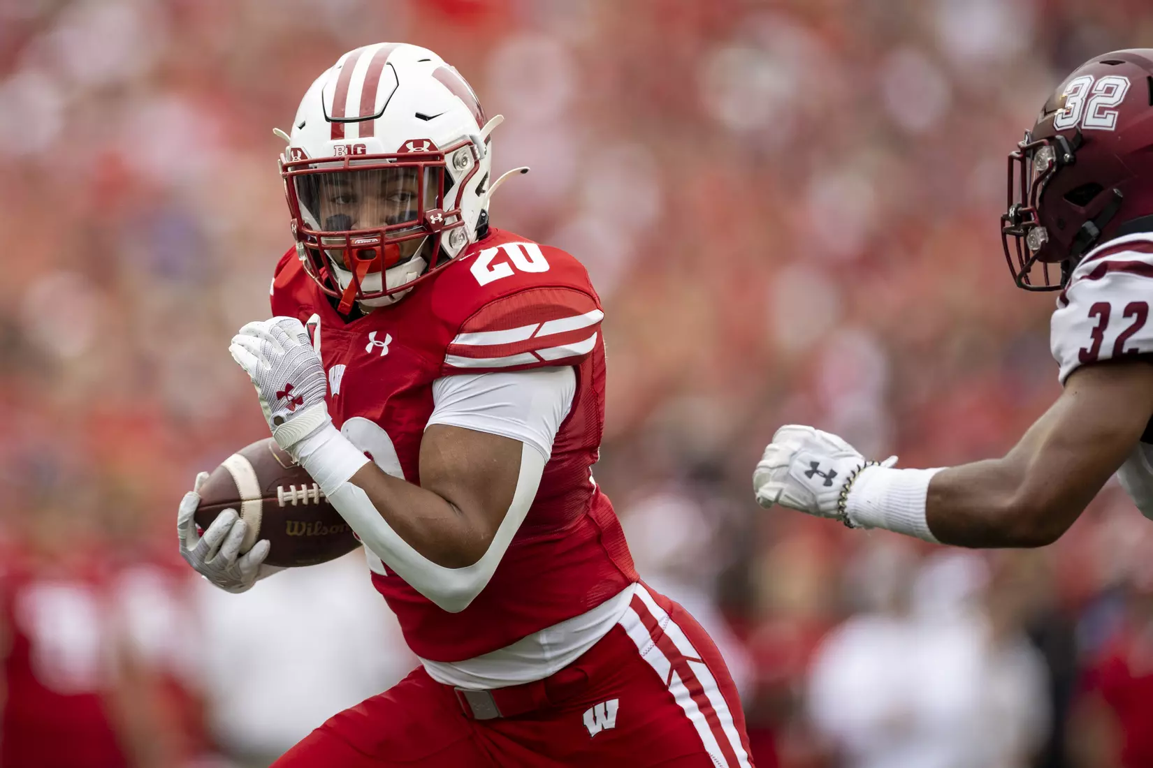 Isaac Guerendo runs the ball in the Wisconsin Badgers game against the New Mexico State Aggies, Saturday, Sept. 17, 2022 in Madison, Wis.