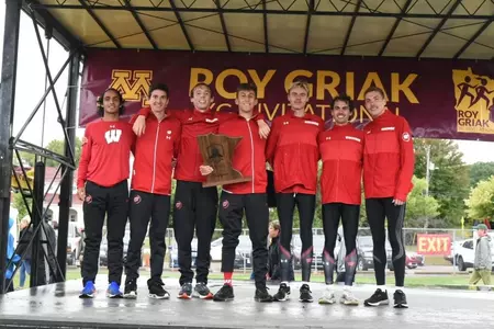The Badgers celebrate their Roy Griak Invitational team title