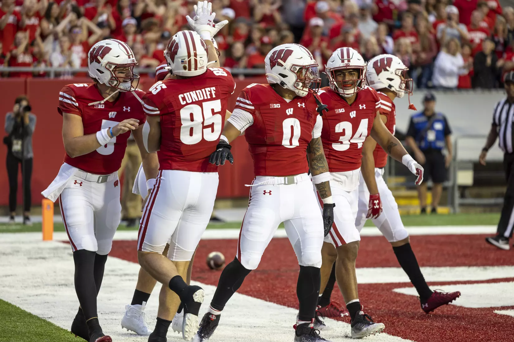 Wisconsin Badgers running back Braelon Allen (0) celebrates his 96-yard touchdown run, the longest in school history, with teammates Graham Mertz (5), Clay Cundiff (85) and Jackson Acker (34) during an NCAA college football game against the Illinois State Redbirds, at Camp Randall Stadium on Saturday, Sept. 3, 2022 in Madison, Wis.