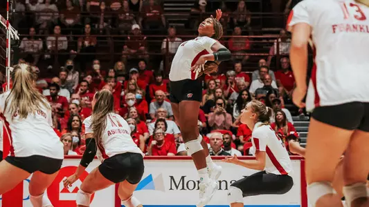 Devyn Robinson goes up a swing on the right side.