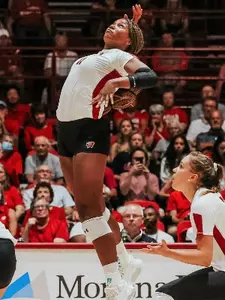 Devyn Robinson goes up a swing on the right side.