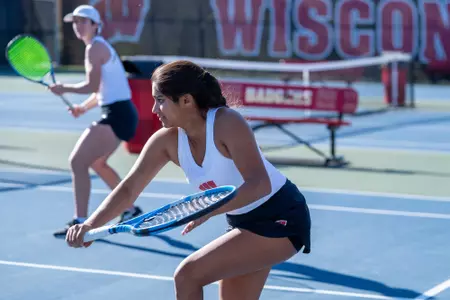 Anisha Apte and Taylor Cataldi during a doubles match