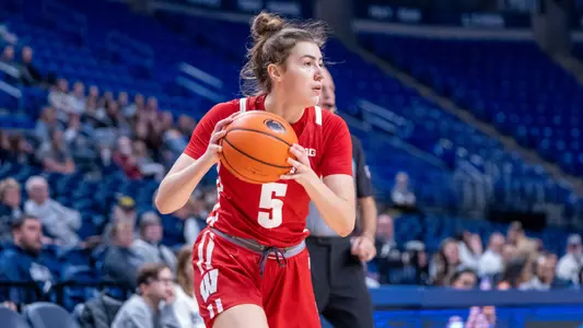 Julie Pospisilova in a triple-threat position