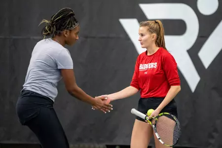 Ariel Johnson and Alina Mukhortova celebrate