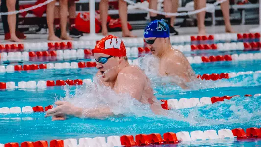 Will Myrhe competes in the breaststroke