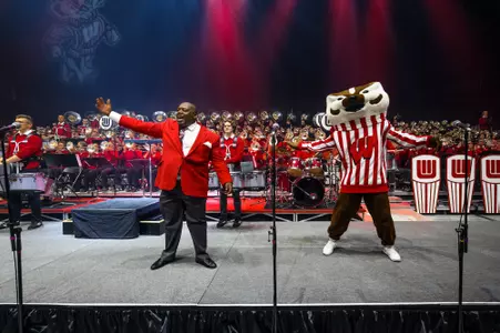UW Varsity Band Concert at the Kohl Center with band director Corey Pompey and UW mascot Bucky Badger