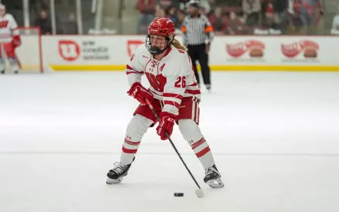 Casey O'Brien handles the puck in a conference matchup against Minnesota Duluth on Jan. 7, 2023 at LaBahn Arena