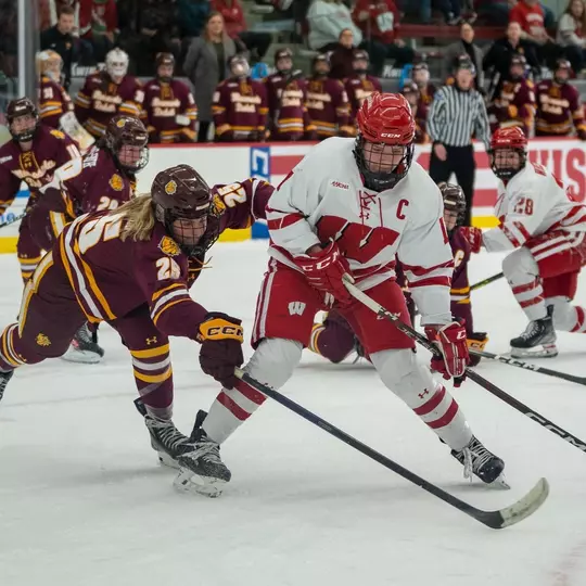 Britta Curl handles a puck against Minnesota Duluth in a WCHA matchup on Jan. 8, 2023 at LaBahn Arena