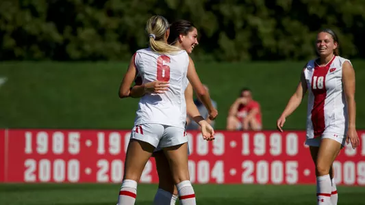 The Badgers celebrate Ashley Martinez's goal