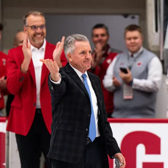 Mark Johnson salutes to the crowd after picking up his 600th career win