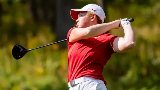 Carly Carter takes a swing at the 2023 Badger Invitational at University Ridge