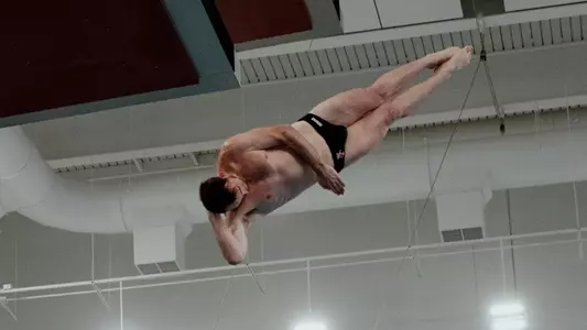 Daniel Muller performs on the 3-meter board