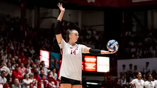 Anna Smrek serves the ball in match vs Ohio State