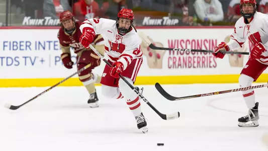 Laney Potter passes a puck
