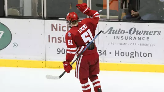 Sophomore forward Cruz Lucius celebrates scoring a goal.