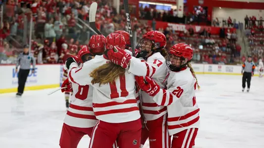 Wisconsin women's hockey celebrates a goal against Boston College on Oct. 5, 2023